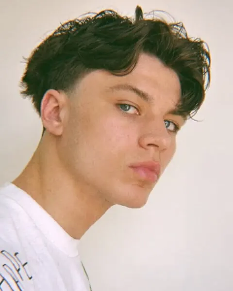 Black and white portrait of Zen Riaz, stylist at Shorn